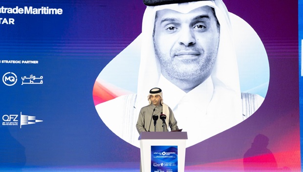 man in traditional arabic dress on stage